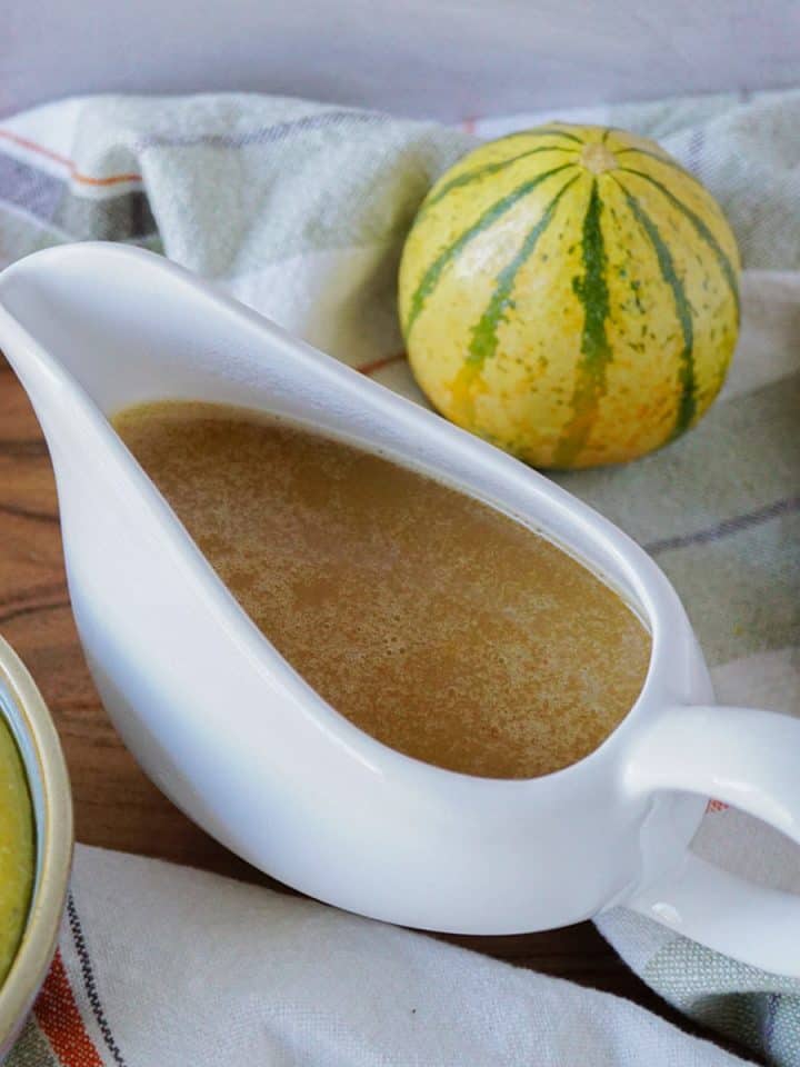 Bone broth gravy in a ceramic sauce boat.