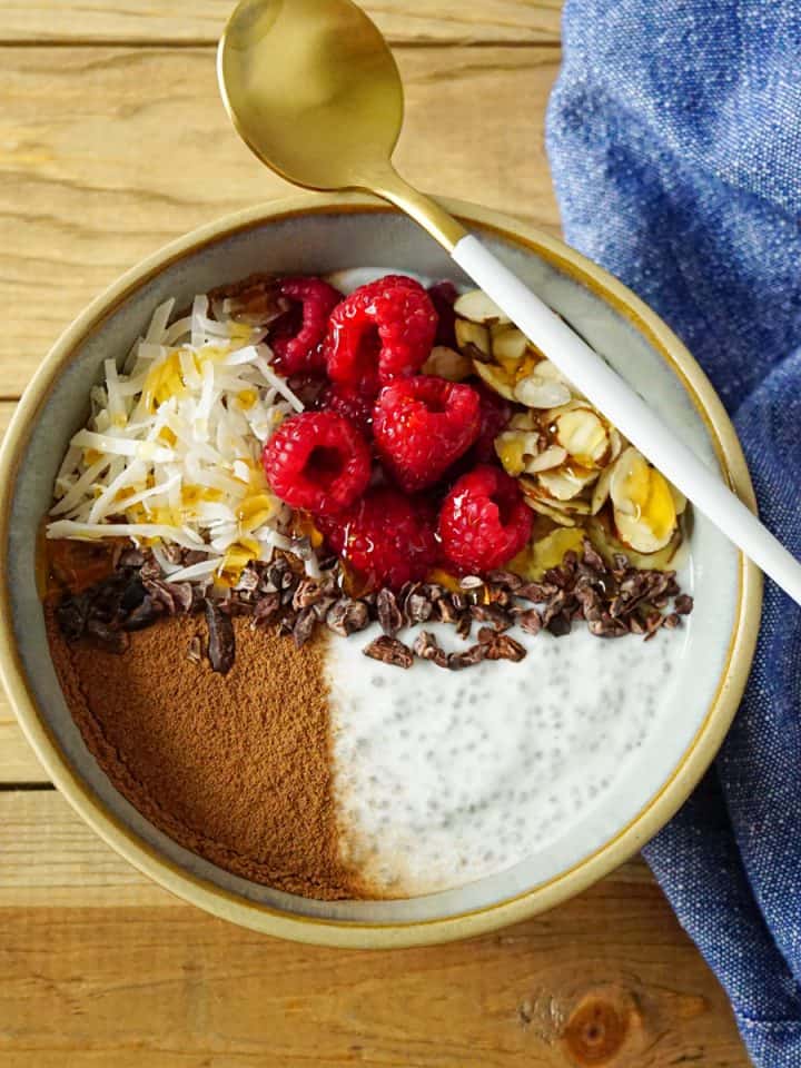 Kefir chia pudding with a spoon on top.